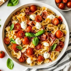 Tomato Garlic Confit Caprese Pasta Salad